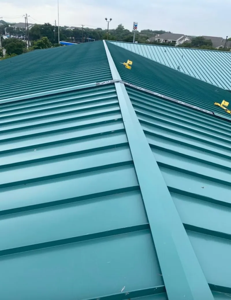 Green commercial metal roof ridge and valley for Metal Roof Repair in Brownsburg